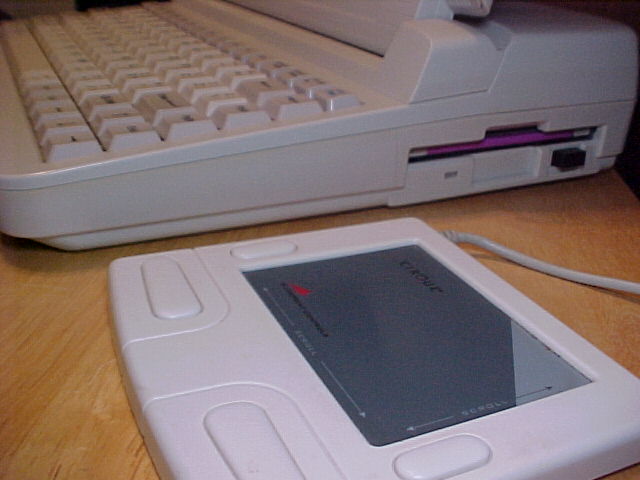 Tandy 1100 FD with touchpad mouse