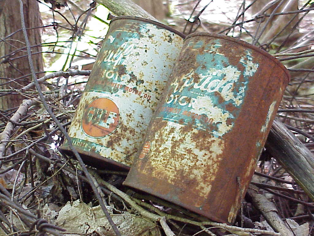 Old motor oil cans
