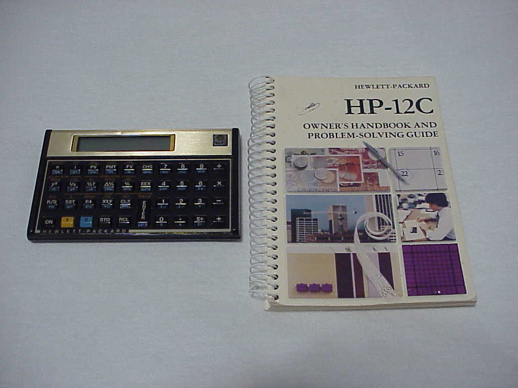 HP-12C calculator and manual