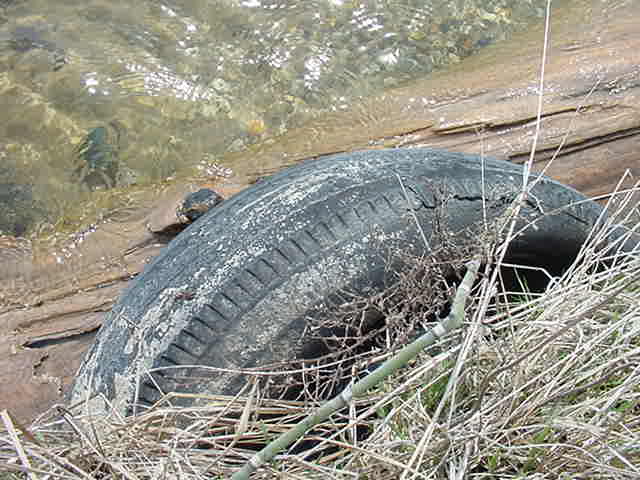Tire stuck in ground