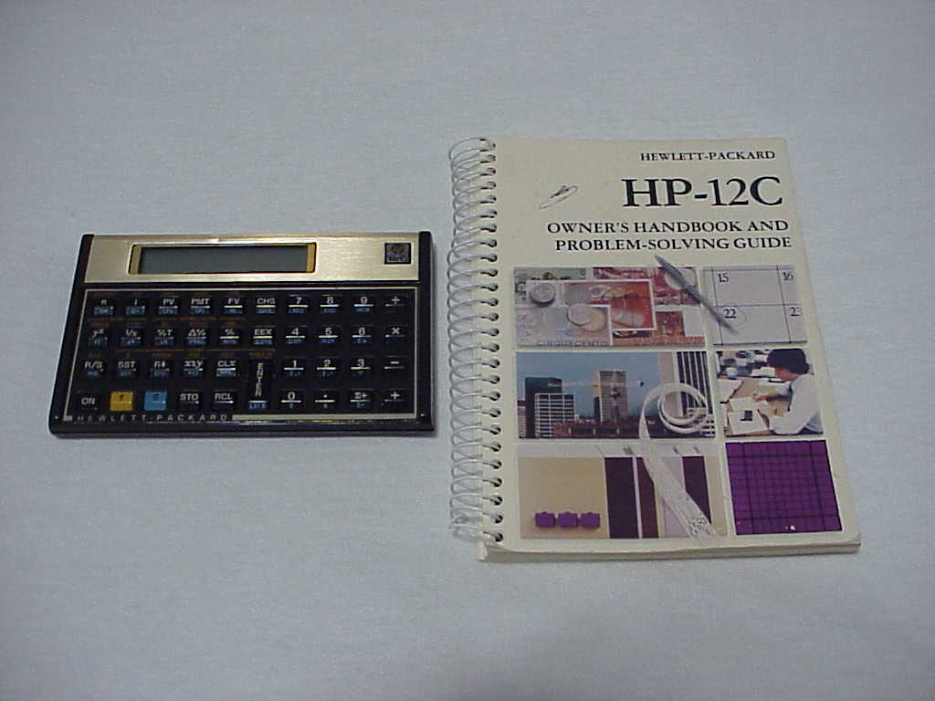 HP-12C calculator and manual