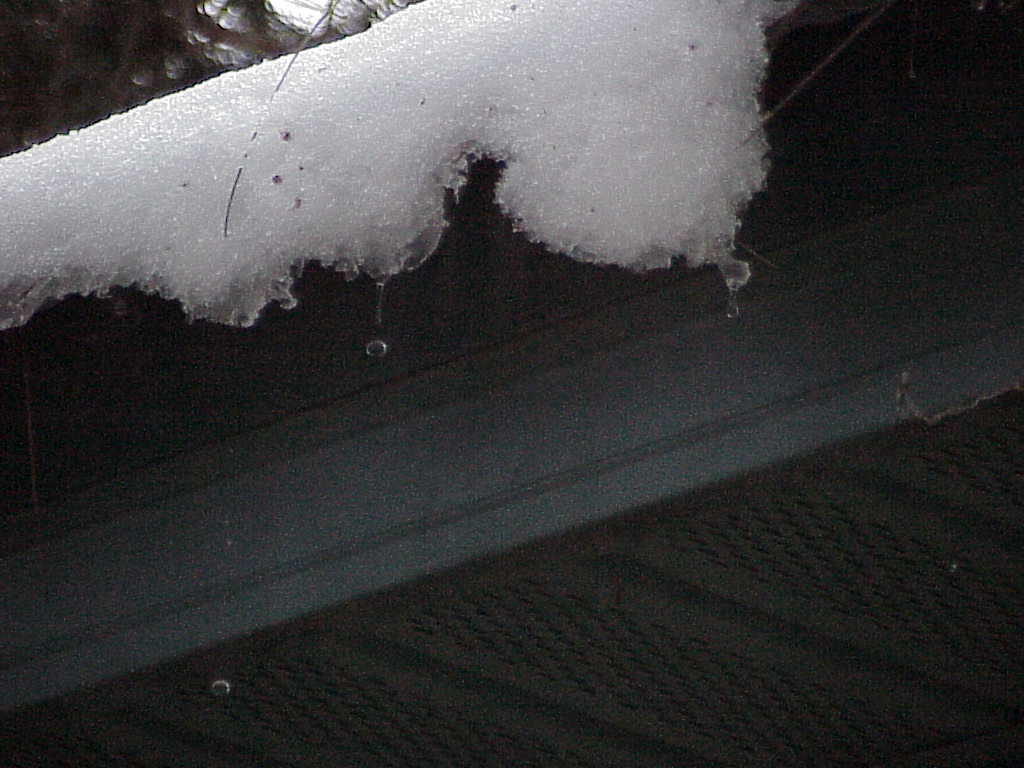 Dripping ice off roof