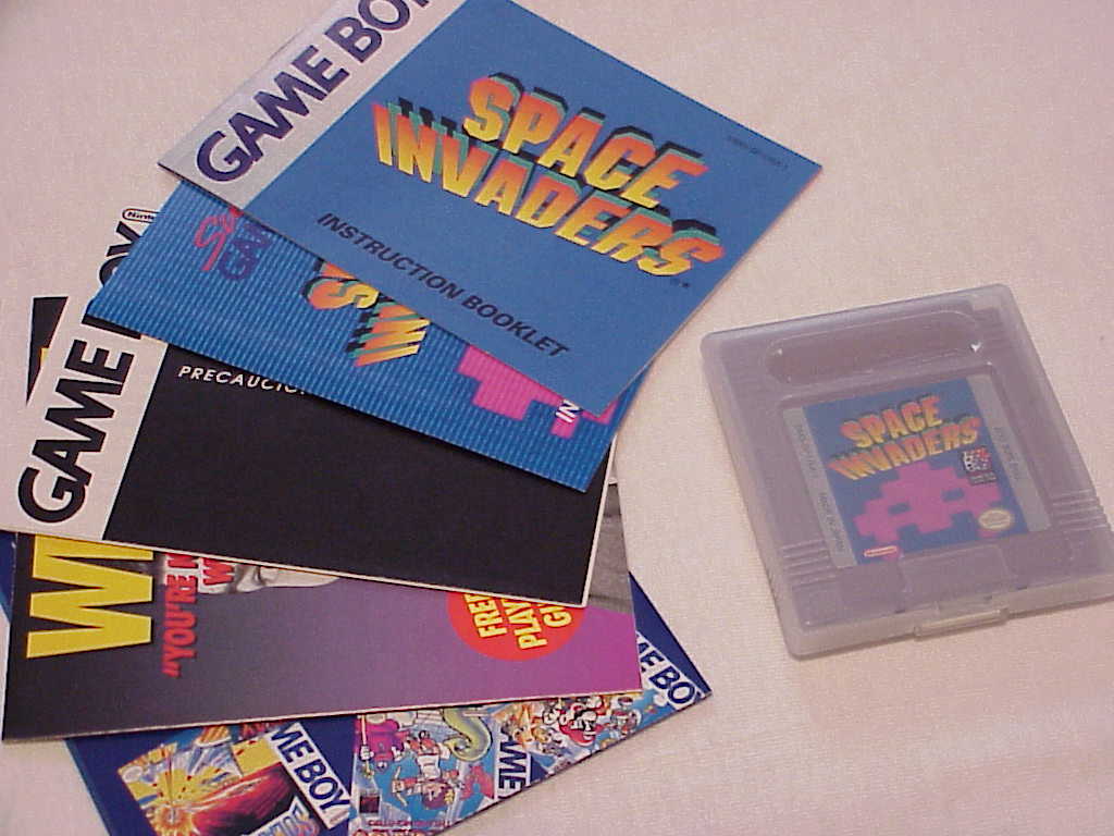 Space Invaders cartridge, manual and inserts