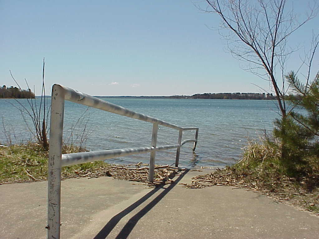 Fence and ramp into lake