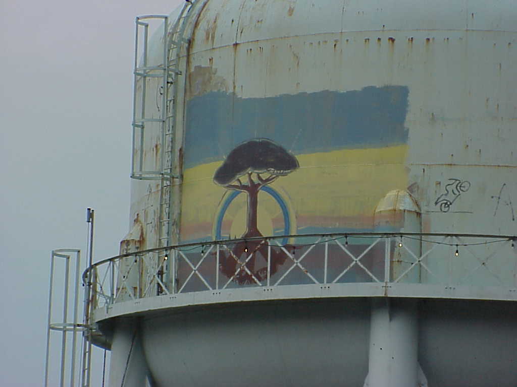 Water tower with graffiti