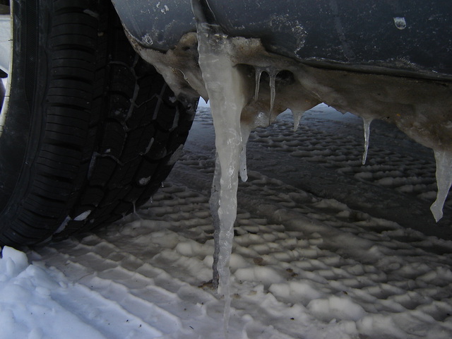 Icicle hanging from car